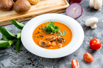 Bouillabaisse is a fish soup with mushrooms, shrimps and herbs.