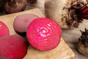 Organic Red beet root on wooden table. Beta vulgaris