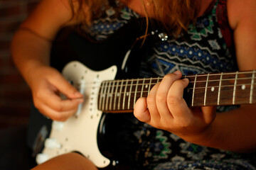 Fototapeta na wymiar woman playing guitar