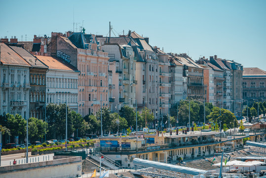 BUDAPEST, HUNGARY, AUGUST 2, 2020: Street in Budapest by Danube river, Jane Haining rkp. typical yellow tram in the city.