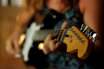 Fototapeta premium aoman playing guitar