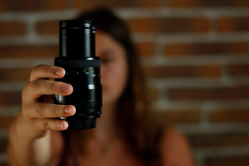 Fototapeta premium woman with lens