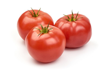 Fresh ripe tomatoes, isolated on white background