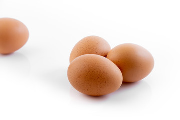 Chicken eggs in carton box isolated on white background