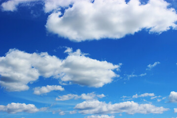 blue sky clouds, blue sky with unusual shaped clouds.