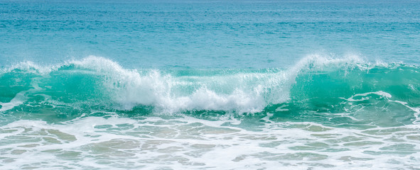 Beautiful sea waves with foam of blue and turquoise color