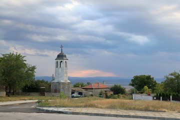 Church in the village of Avren (Bulgaria) in the evening at sunset