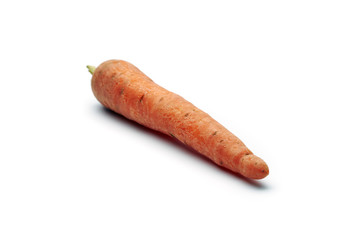 Close-up of fresh raw carrot isolated on white background