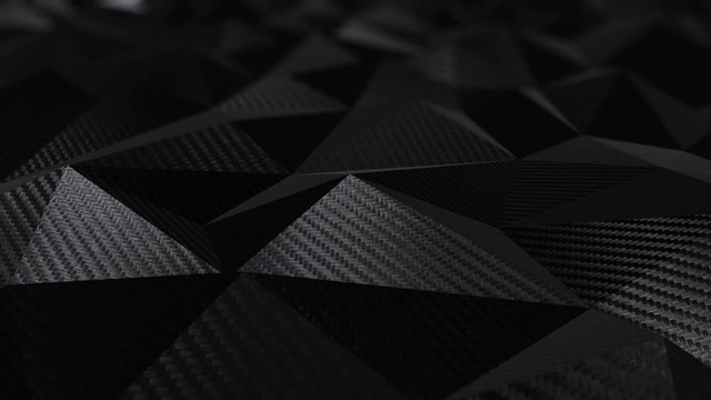 Carbon black triangular polygonal geometric background seamless motion loop. 3D animation
