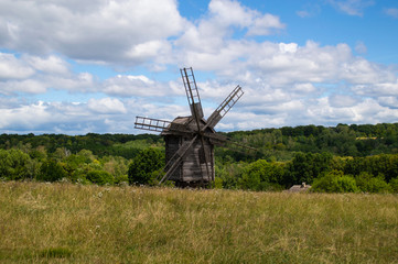 Plakat old windmill in the field