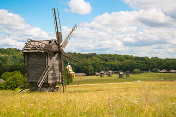 Fototapeta na wymiar old windmill in the field