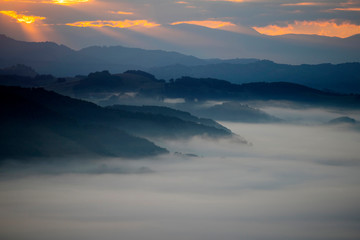 Magic sunrise in a Carpathian mountain valley