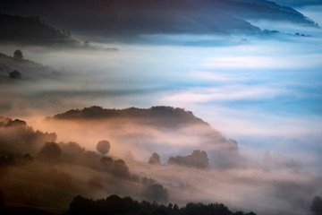 Magic sunrise in a Carpathian mountain valley