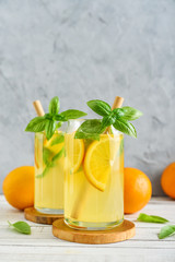 Lemonade with orange and basil