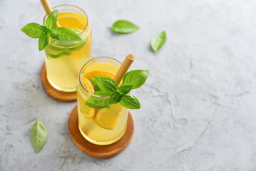 Lemonade with orange and basil