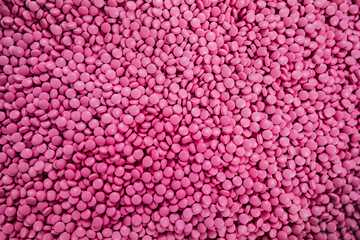 Obraz premium Lots of pink pills. Abstract medical picture. Background image