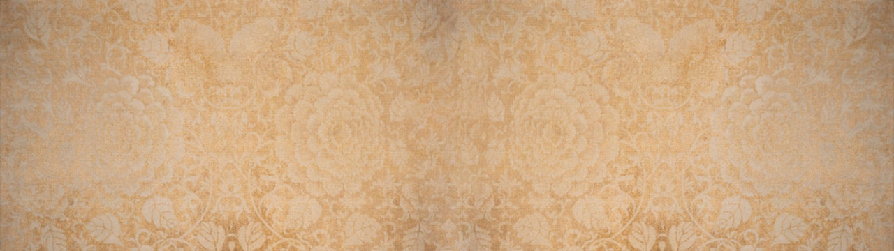 Old bright pastel brown beige vintage shabby patchwork flower motif tiles stone concrete cement wall texture background banner