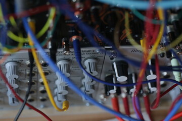 Modular system - Synthesizer - electronic music - patch cables - close up