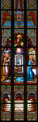 Stained glass window depicting the Annunciation to the Virgin Mary by Gabriel the Archangel. St Martin's Cathedral, Bratislava, Slovakia. 2020/05/20. 