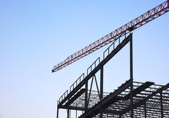 crane on construction site metal structure tower