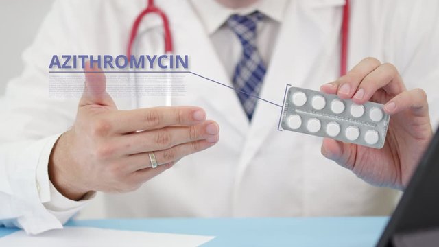 Azithromycin blister pack with tablets in doctor's hand