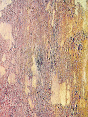Creative bright metallic background. Flat background texture of dirty rusty metal. Bright rusty spots as the main background for a vintage scratched design