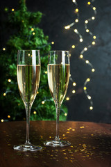 Two champagne glasses ready to celebrate in  New Year