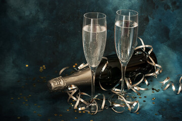 New years  celebration background with champagne bottle and glasses