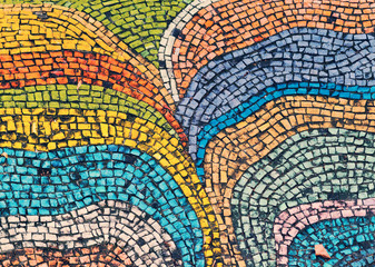 Detail of beautiful old collapsing abstract ceramic mosaic adorned building. Venetian mosaic as decorative background. Selective focus. Abstract Pattern. Abstract mosaic colored ceramic stones