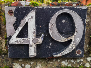 house number plaque with number 49