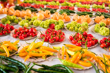 Various Kinds of Pepper in Small Paper Plates at Brazilian Market
