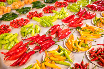 Various Kinds of Pepper in Small Paper Plates at Brazilian Market