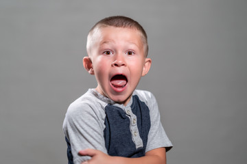 Cash Cotton posing looking surprised holding himself