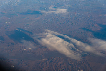 Land and clouds from the sky