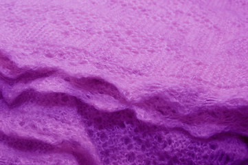 Orenburg shawl out of pink yarn warms and has a healing effect, protects in the cold winter