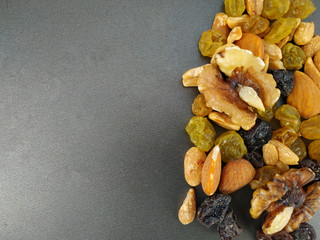 Fototapeta na wymiar aerial view of nuts on a black background