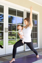 Fototapeta premium woman's fitness with baby at home