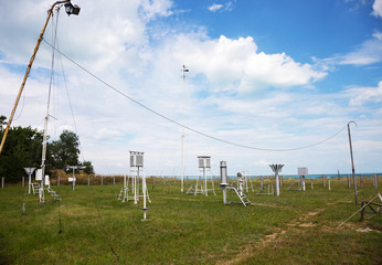Fototapeta na wymiar Weather meter with sea background. Weather station on the coast of the Black sea in a summer Sunny day.