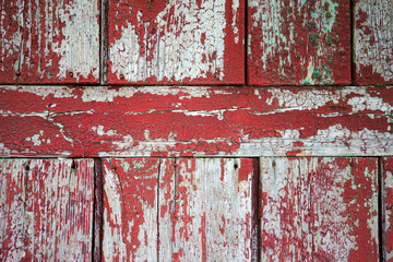 Wooden planks background. Wooden planks with cracked old paint residue. Withered old fence boards. As background for creative design.