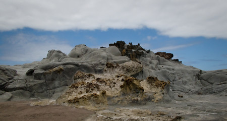 Fototapeta na wymiar Mound of different volcanic materials near the coast