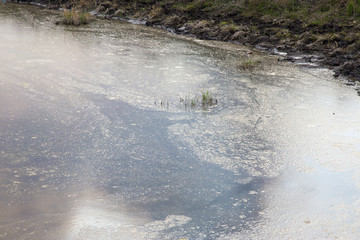 Sewage drains into the river, the sea, the lake. Environmental pollution. Wastewater, ecological catastrophe