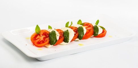 Delicious gourmet food on the table. Gourmet cuisine in white dish. Creative restaurant concept.