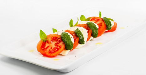 Delicious gourmet food on the table. Gourmet cuisine in white dish. Creative restaurant concept.