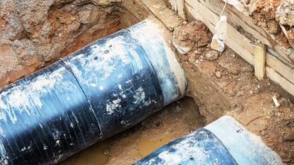 Pipes and cables. Repair of communications. Water supply, electricity, Sewerage. Excavated roads in...