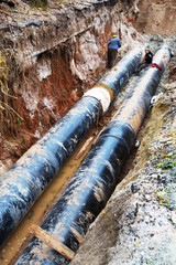 Pipes and cables. Repair of communications. Water supply, electricity, Sewerage. Excavated roads in...