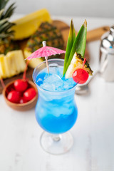 blue hawaii with pineapple on background