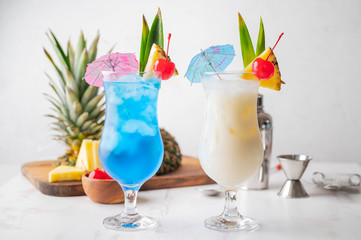 Summer cocktail image, pina colada and blue hawaii