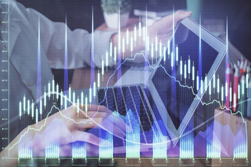 Double exposure of woman hands typing on computer and forex chart hologram drawing. Stock market invest concept.