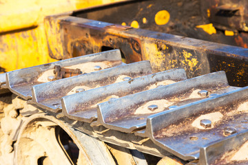 Fragment of tractor tracks. Radioactive dead zone of Chernobyl. Abandoned looted appliances, cars, electronics in Chernobyl accident. Consequences of evacuation, looting, vandalism after an explosion