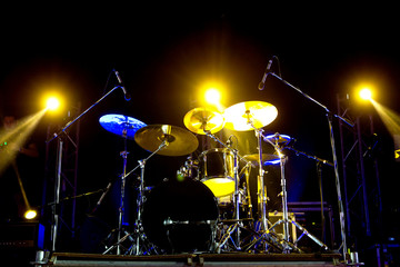 Fototapeta na wymiar Live music photo background, rock drum set with cymbals. Closeup photo, soft selective focus
